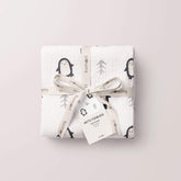 Arctic Penguins swaddle folded and tied with ribbon and tag